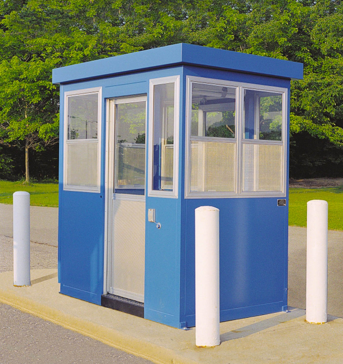 A Carbis Solutions guard shack at the entrance of a facility.