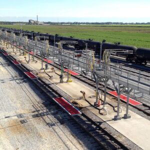 A multi hatch railcar loading system that spans for about 20 railcars in the middle of two rail tracks.