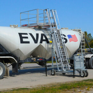 A Carbis portable tanker truck access system is pulled up onto a tank car.