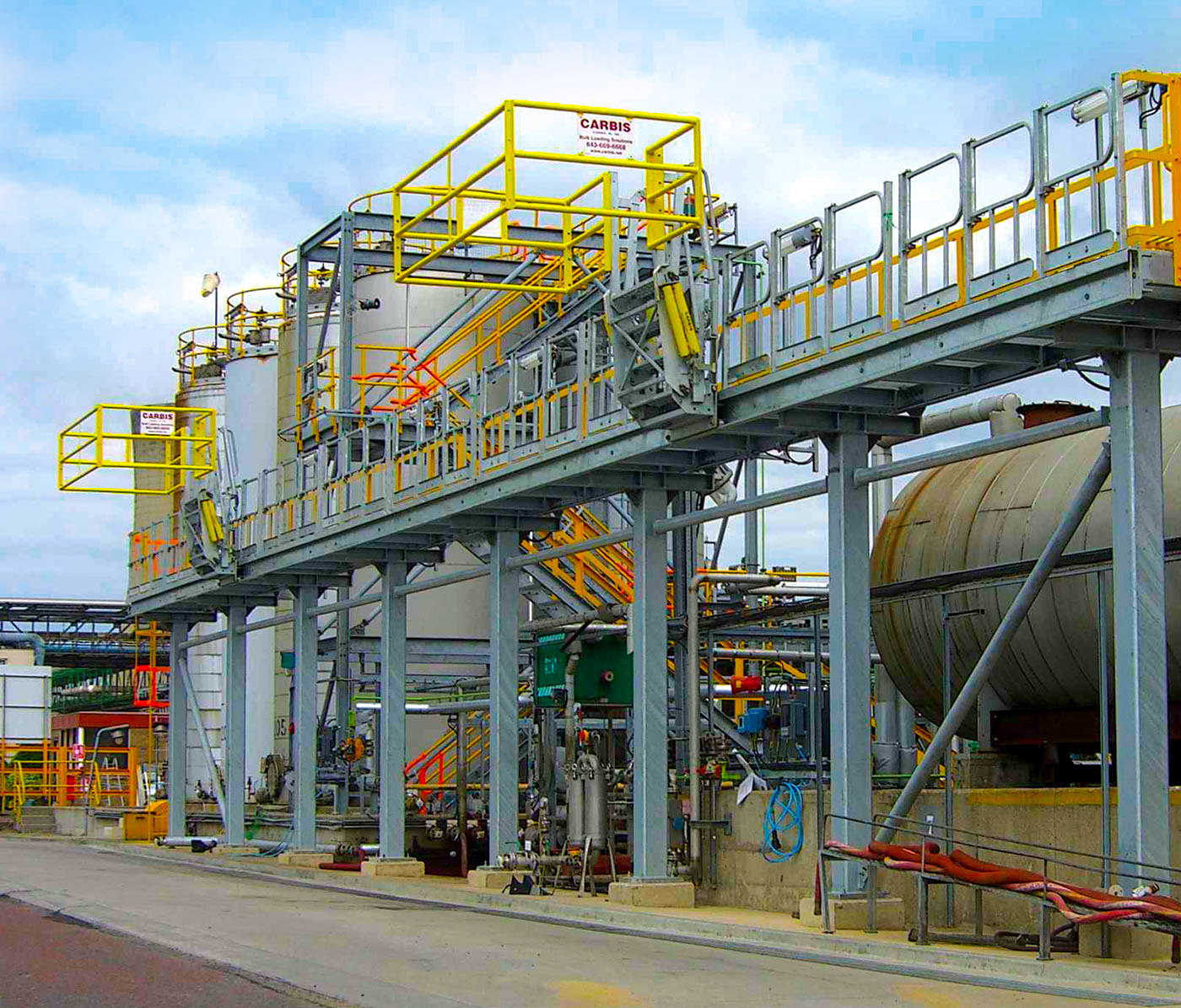 Swing gates on a loading platform in a refinery.