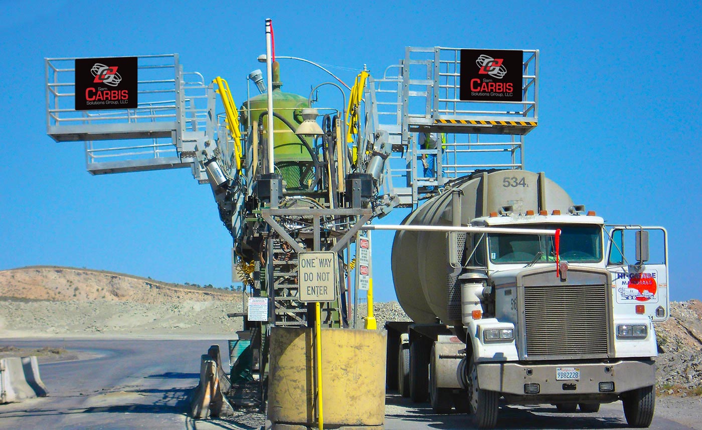 Multi-hatch truck loading system in the middle of a road.