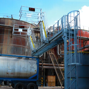 Carbis single hatch truck loading system above a tank truck.