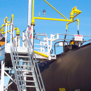 Unit train loading platform above a tanker railcar.