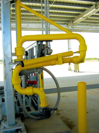 A bottom loading arm on a skid.