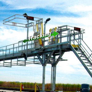 A track mounted gangway is shown on a loading platform.